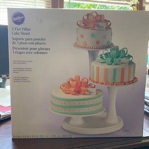 Wilton 3 tier pillar cake stand. White in color.